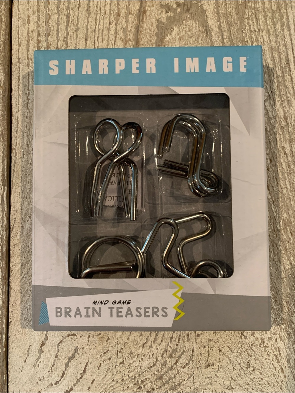 Sharper Image Chrome Brain Teaser Metal Puzzle Set